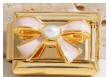 Gold Raised Light Pink Bow